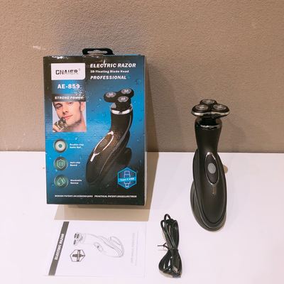 Yüz kullanımı için paslanmaz çelik bıçağı ve plastik kolu olan taşınabilir erkek elektrikli traş makinesi